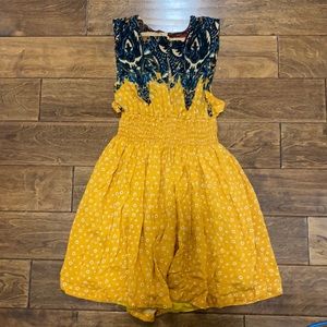 Free people mini dress lined with smocked waist and pockets